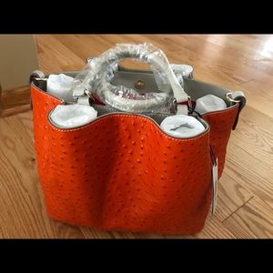 Dooney and burke handbag. NWT. Geraniums color. Beautiful Orange Ostrich
